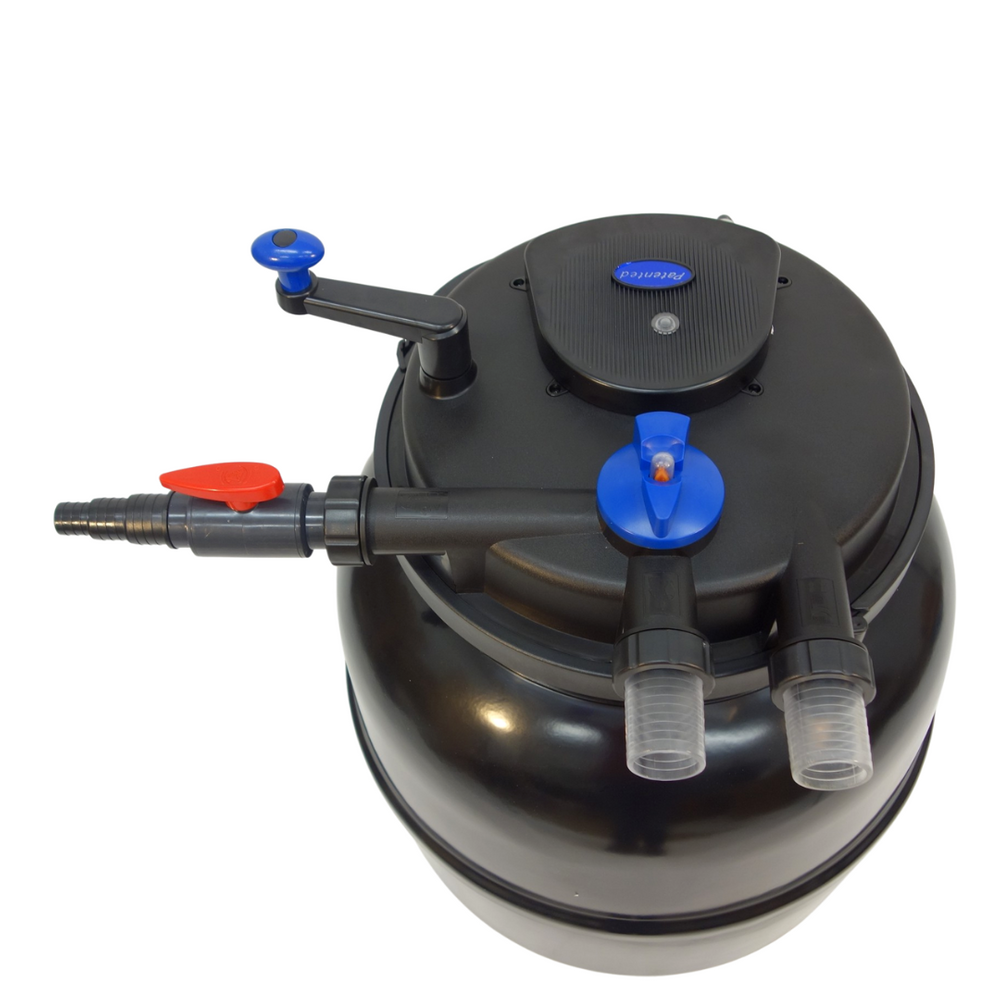 Black oil filter with various connectors on a white background